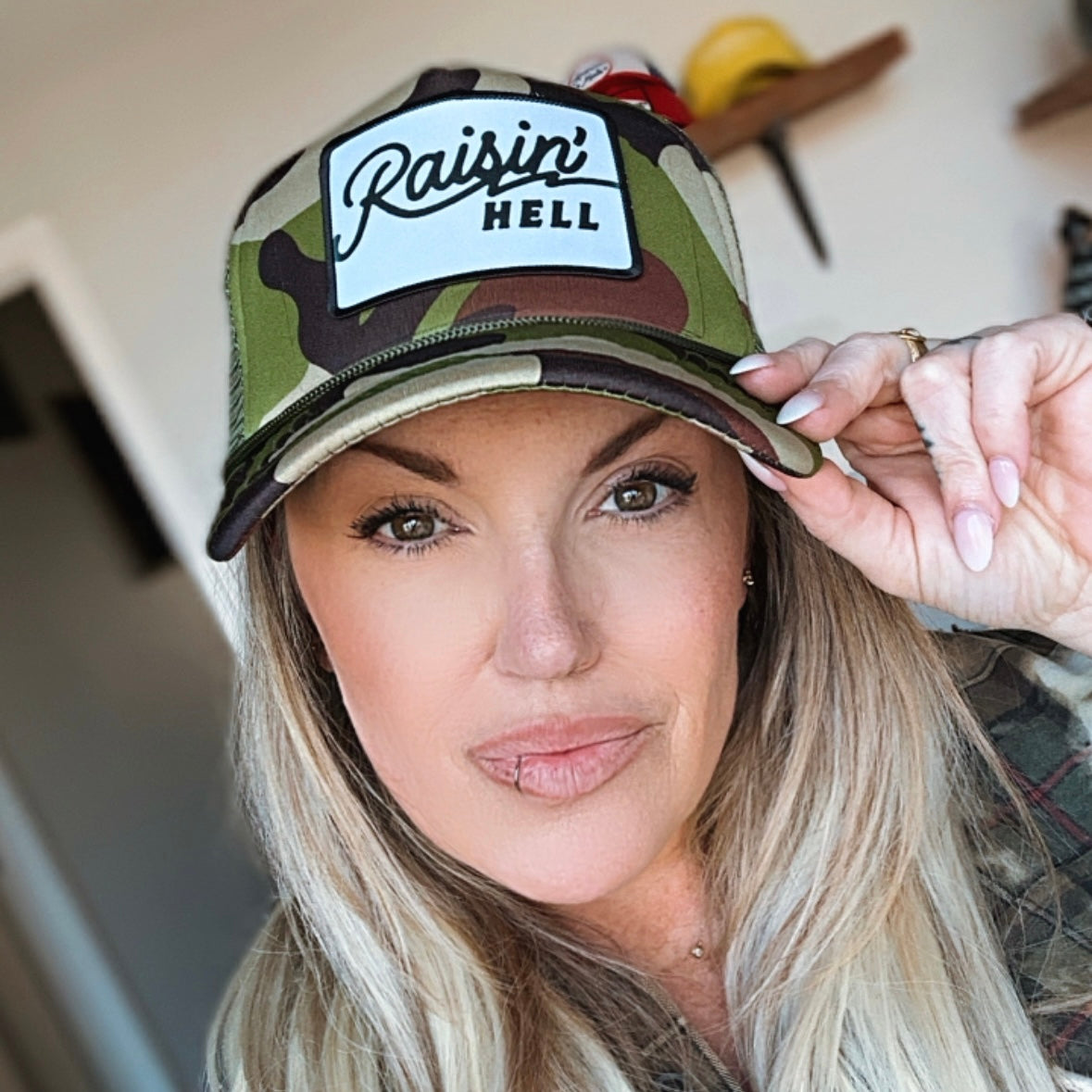 Raisin’ Hell Trucker Hat